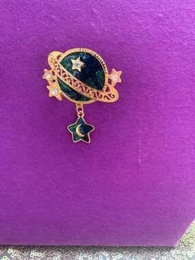 Gold-tone Saturn and Star Dangle Brooch with Dark Green Enamel